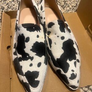 New with tags-Women’s size 11 cow-print flats.